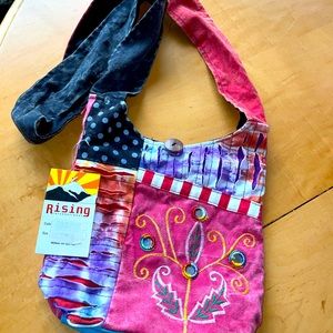 Rising International small hobo bag.